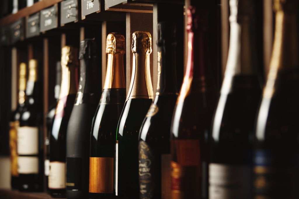 Differing wine bottles lined up in a row