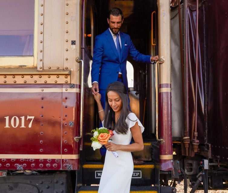 Bride and groom disembarking Wine Train