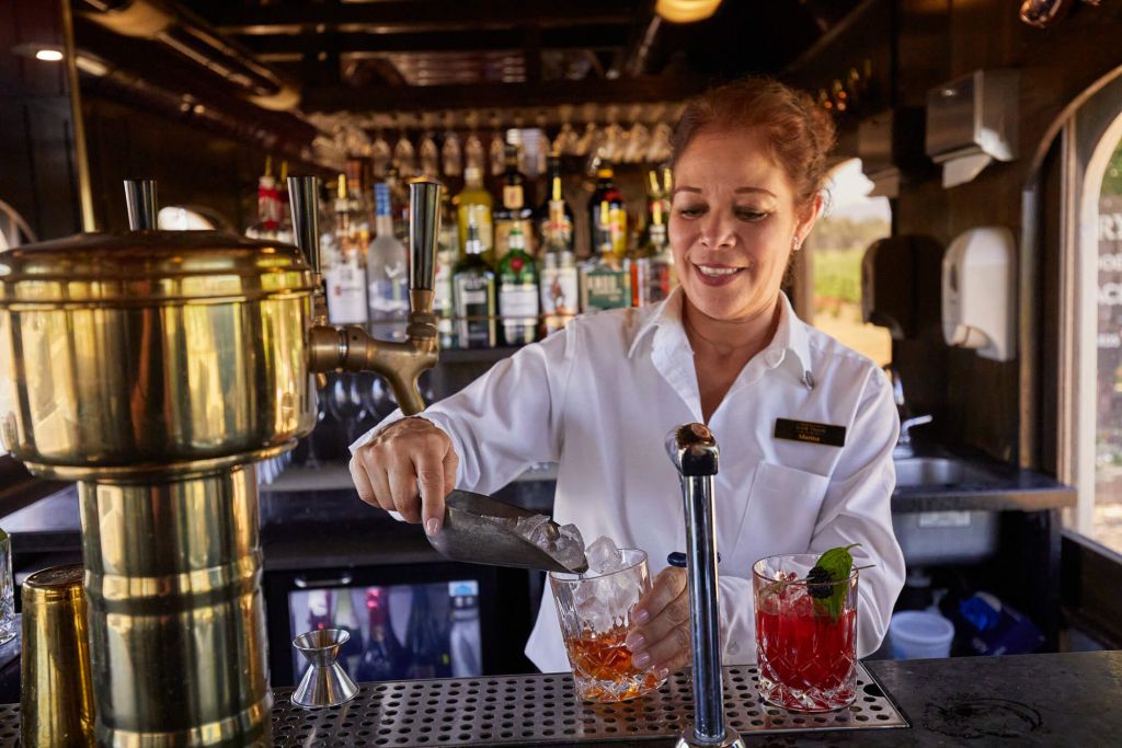 Bartender making cocktails