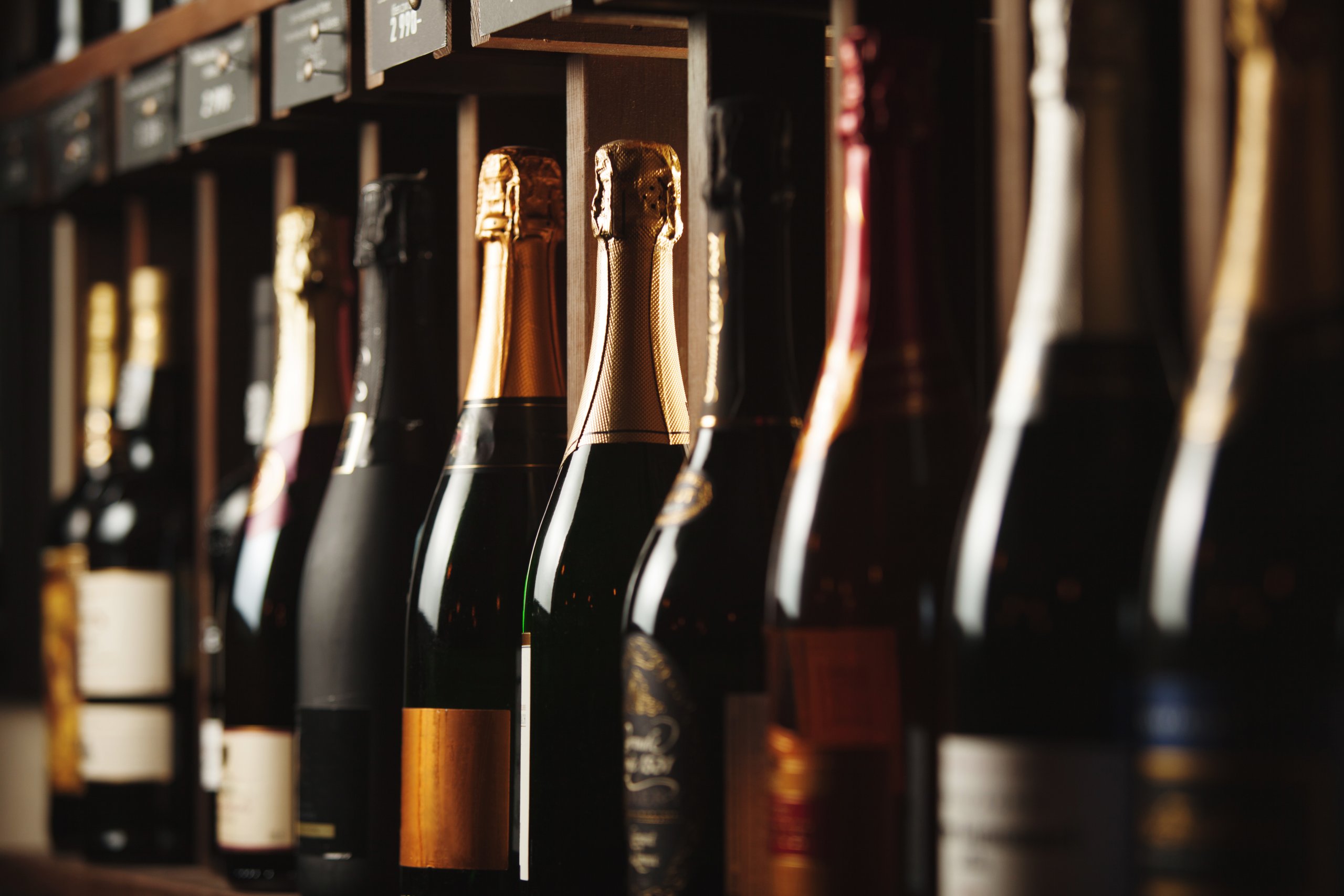 Differing wine bottles lined up in a row