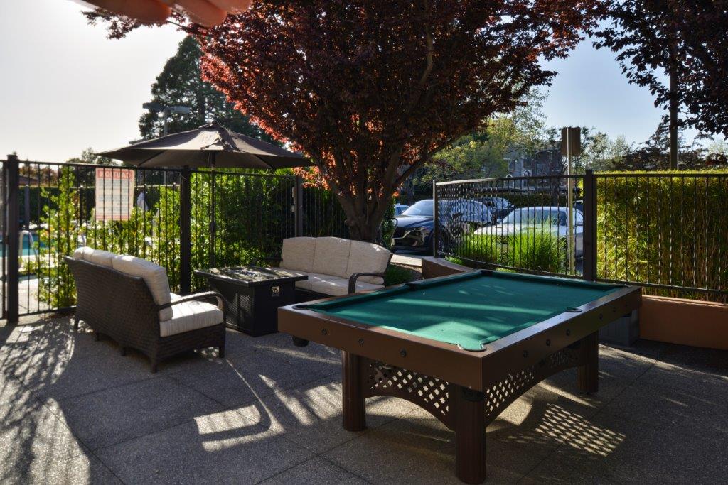 Outdoor pool table and lounge area