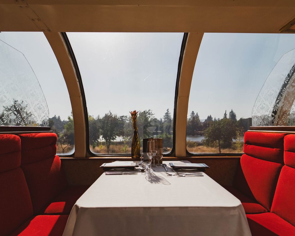 Red velvet booth seating and dining table