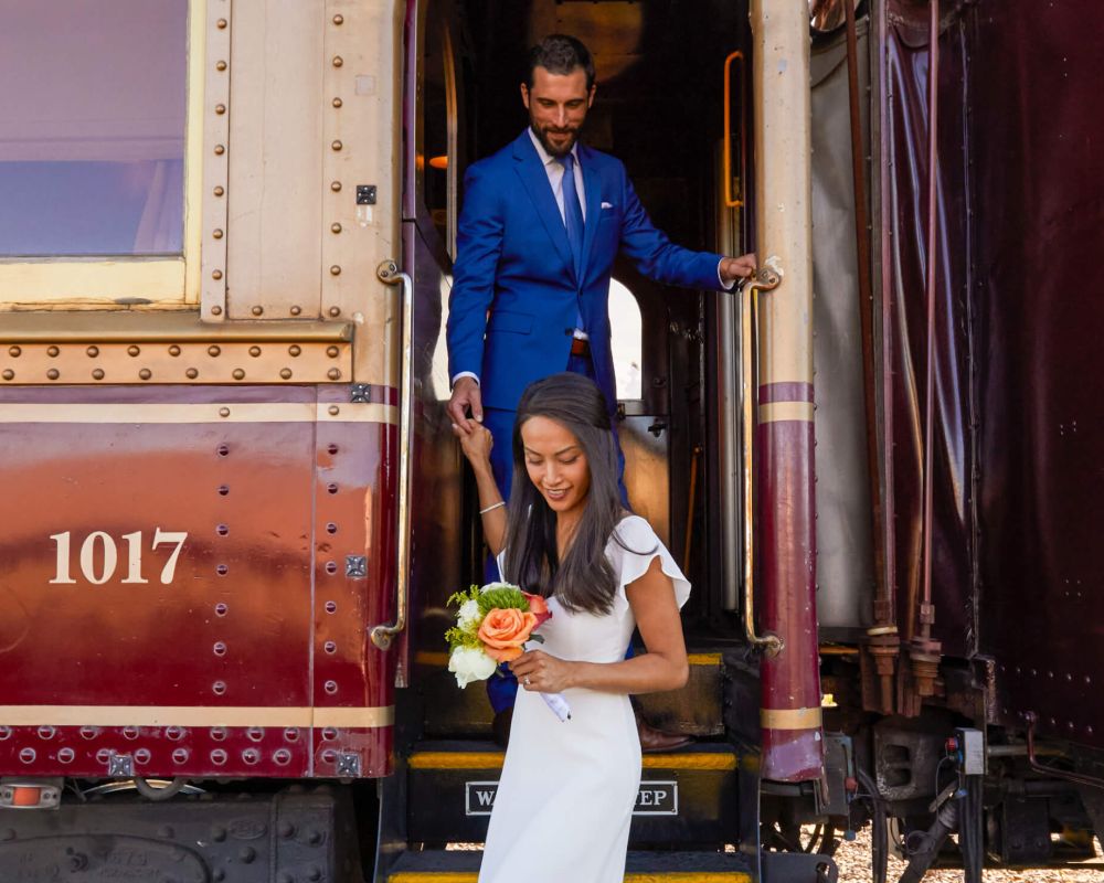 Bride and groom disembarking Wine Train