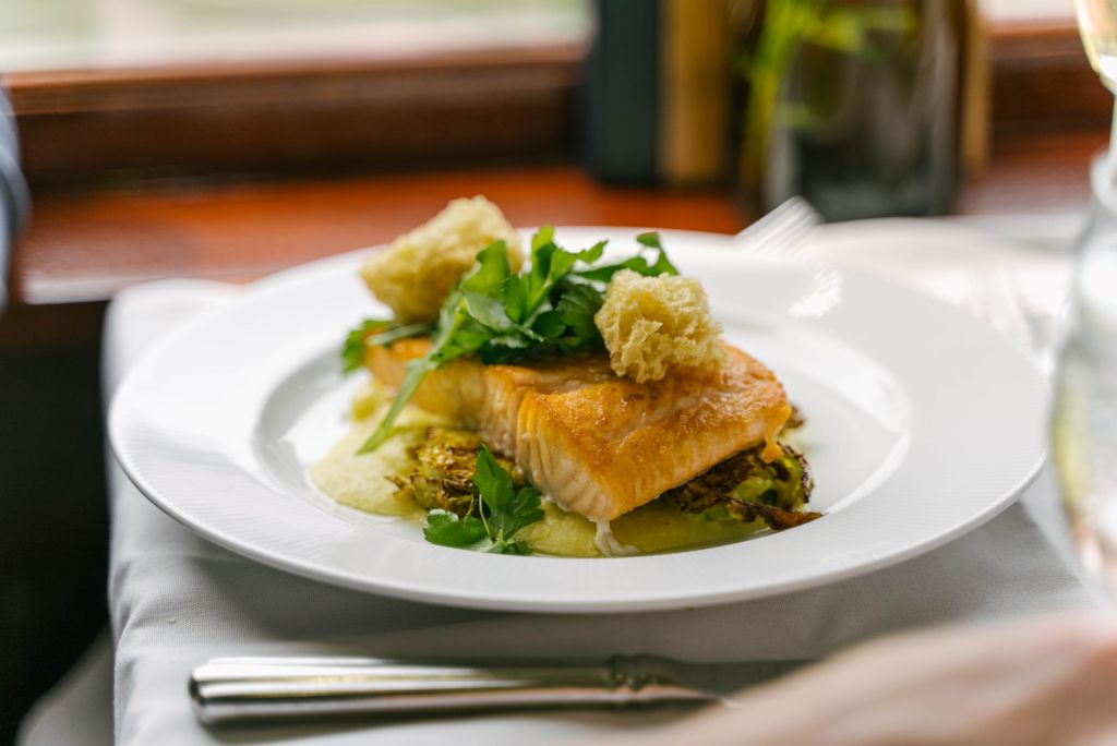 Professionally plated fish with Brussel sprouts