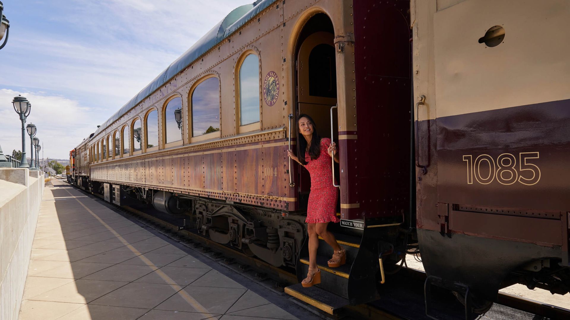 Woman disembarking train
