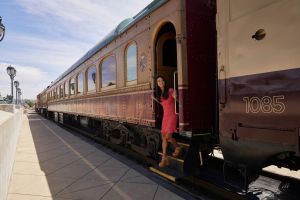 Woman disembarking train