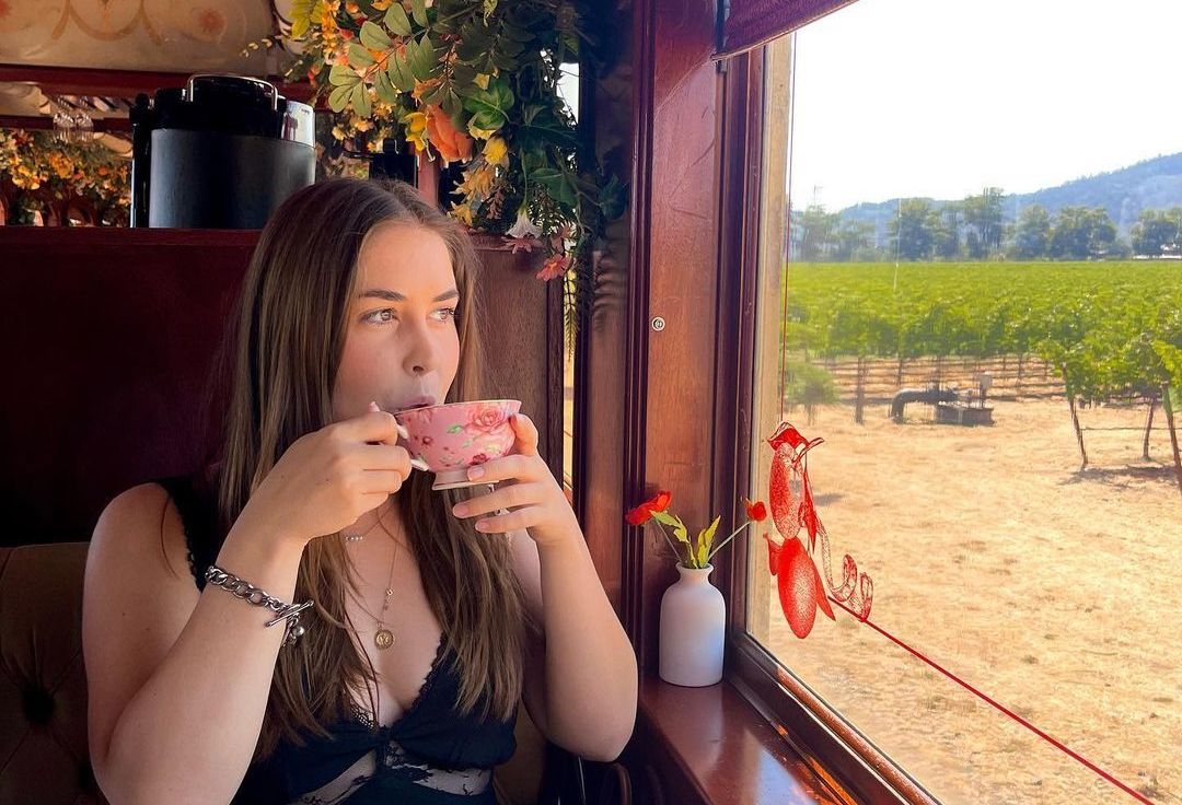 Woman sips her Afternoon Tea
