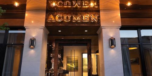 Acumen exterior at night
