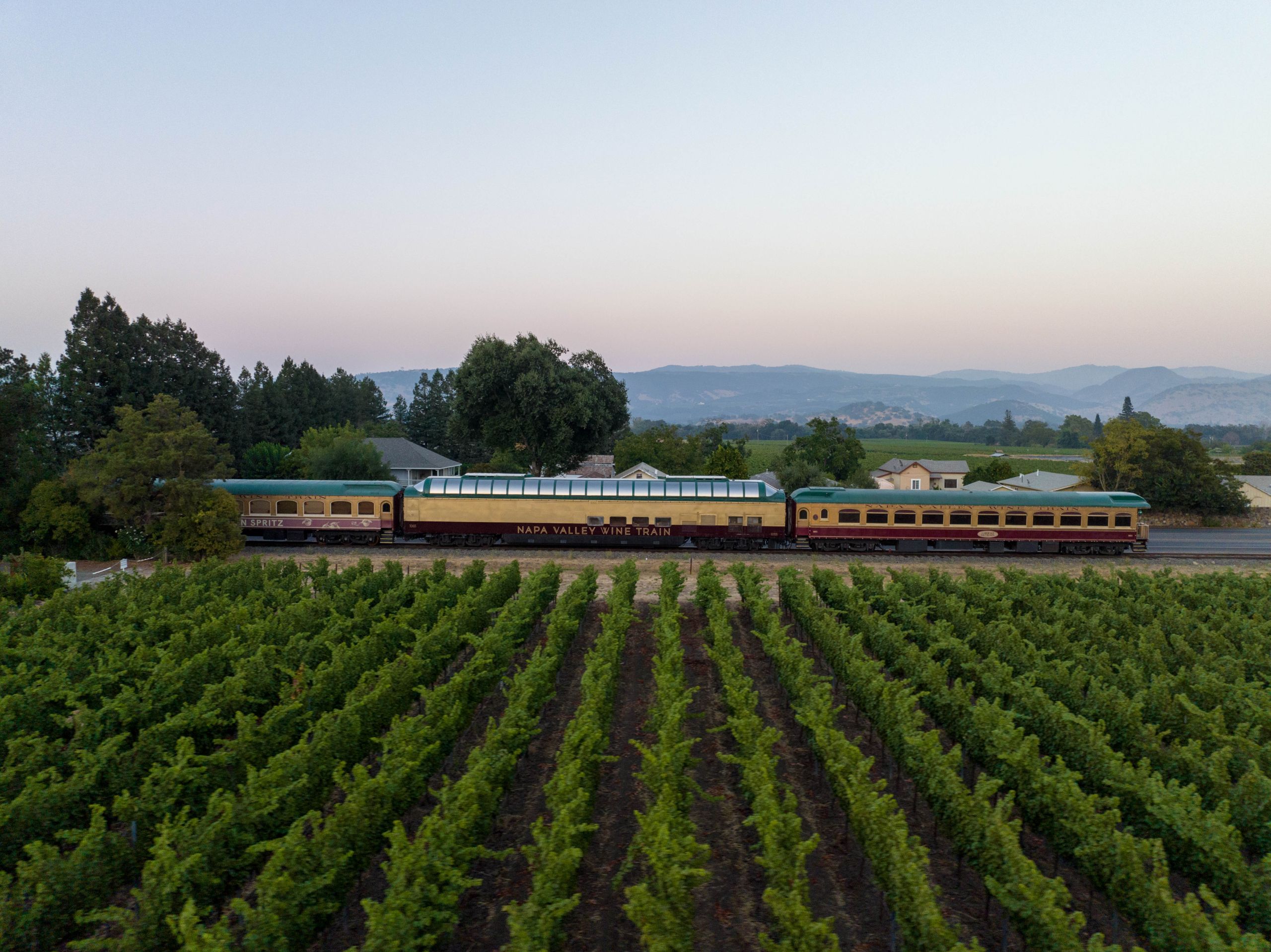 Aerial view of the wine train passing a vineyard